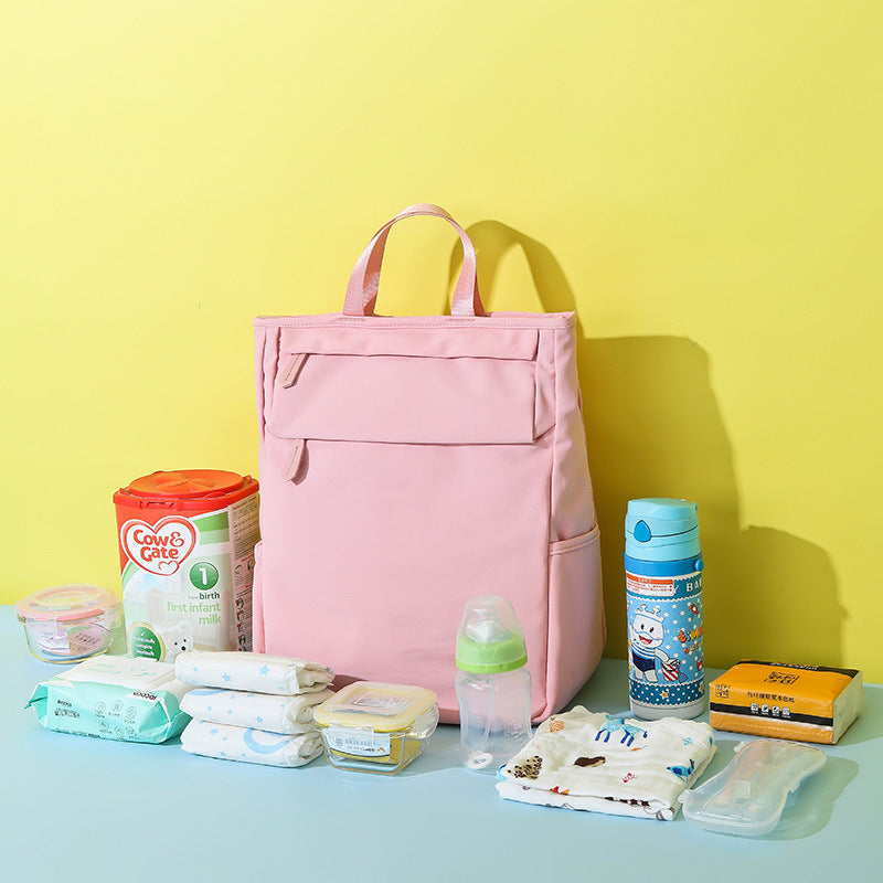 Professional Title: "Compact Diaper Bag Backpack for Busy Moms"